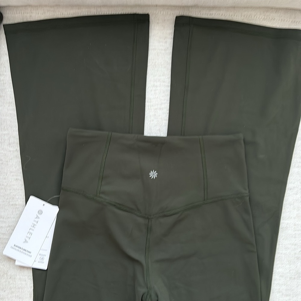 Athleta Elation Flare Pant. Powevita Fabric in Olive Green. Size S. NWT.